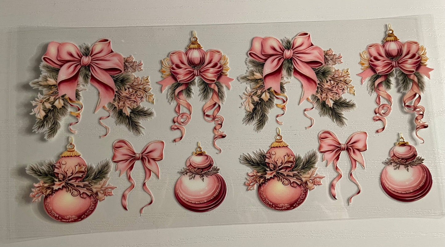 Pink ornaments and pink bow wrap￼